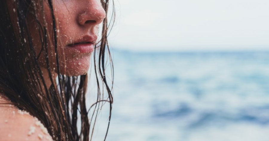 Protect Your Hair From UV Sun Damage, Chlorine, and Saltwater with Coconut Oil